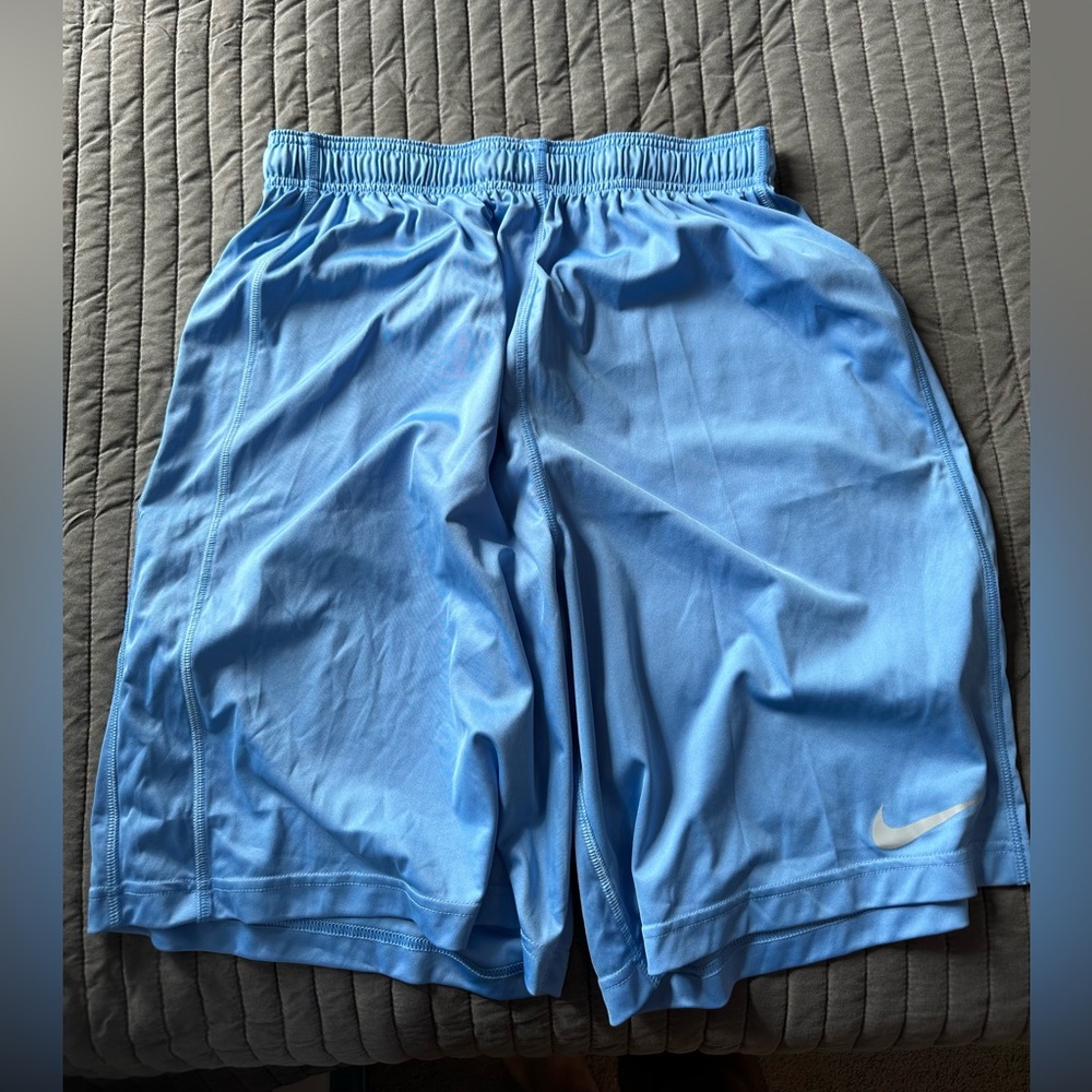 Blue Nike athletic shorts in size large NEW (no pockets)